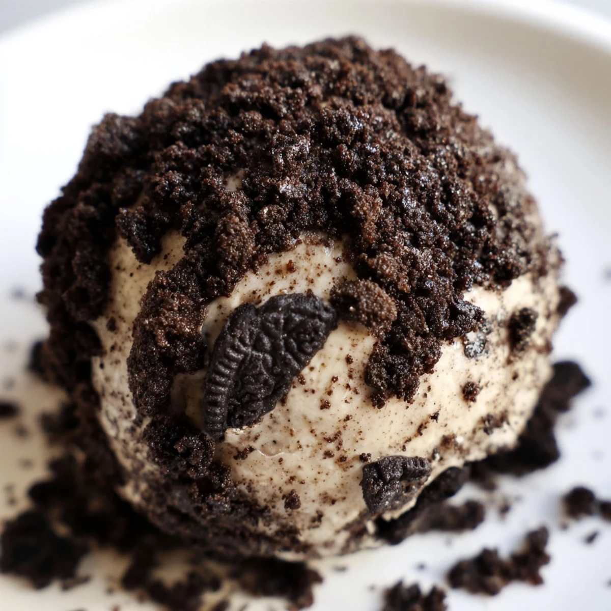 No bake Oreo protein balls on a tray, drizzled with chocolate and perfect for dessert or post workout.